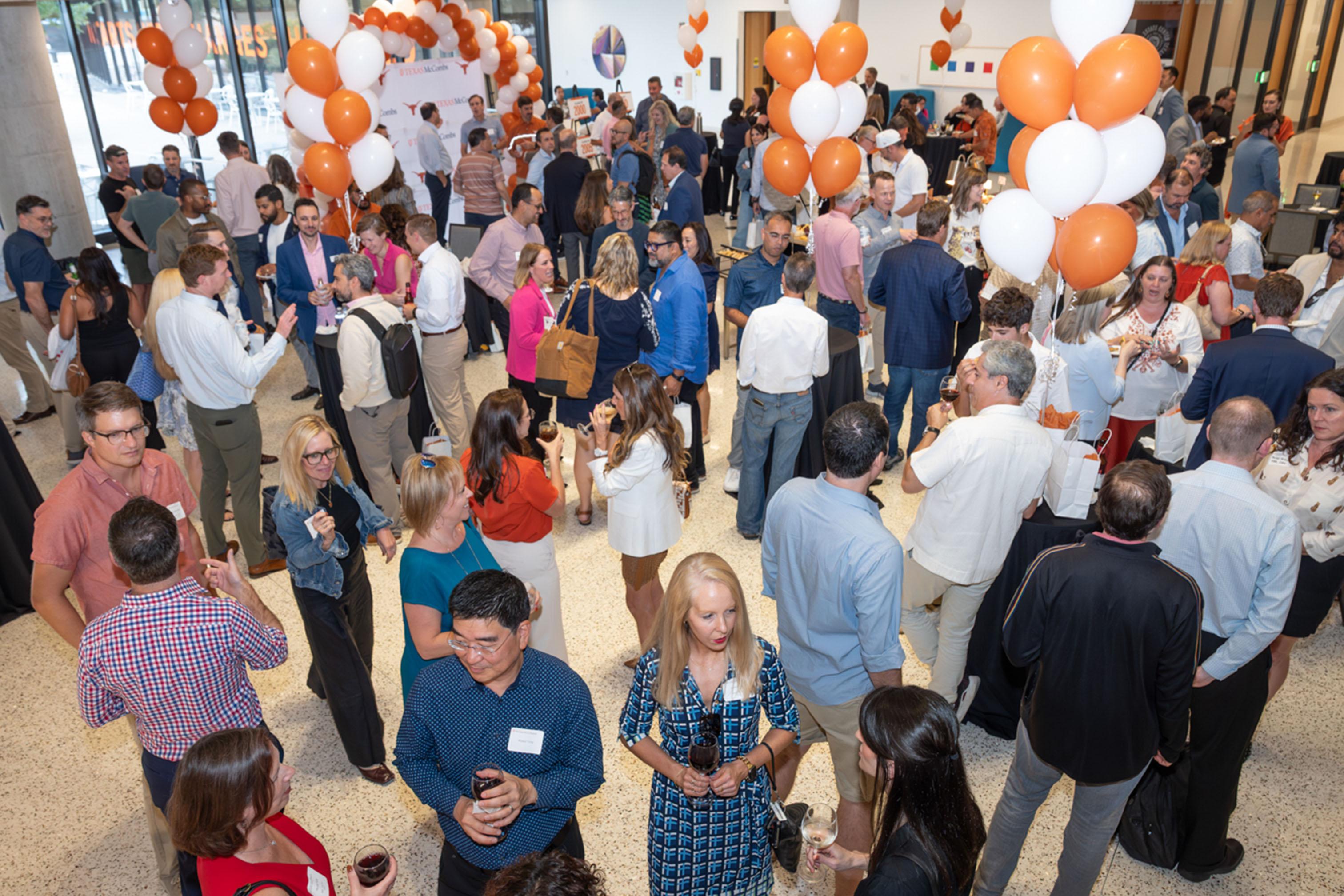 Candid photo of mingling at reunion reception.